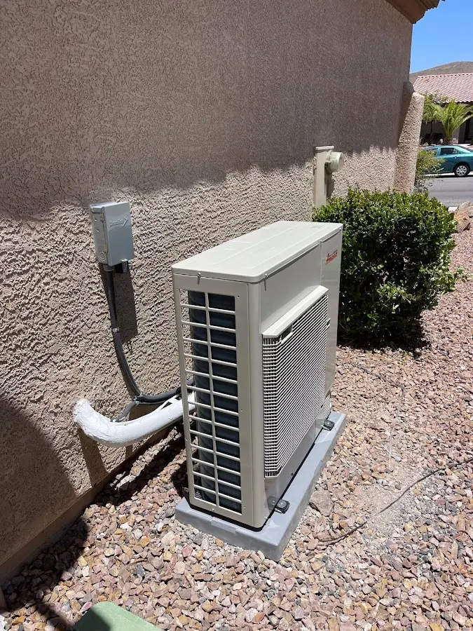 Residential air conditioning condenser unit in Sinton