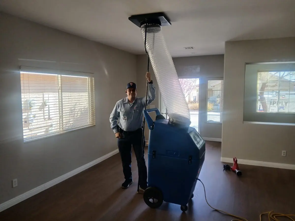 Professional Dryer Vent Cleaning work inside a Sinton home